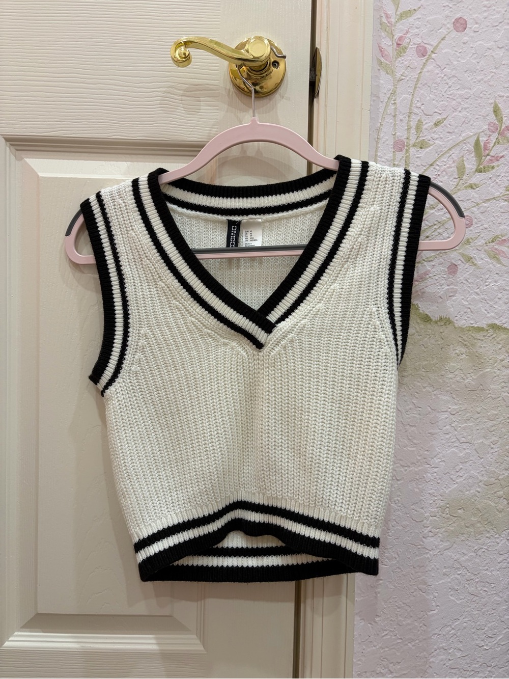 Divided White Knit Vest with Black Trim